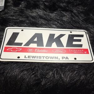 Vintage License Plate with Car Logos.